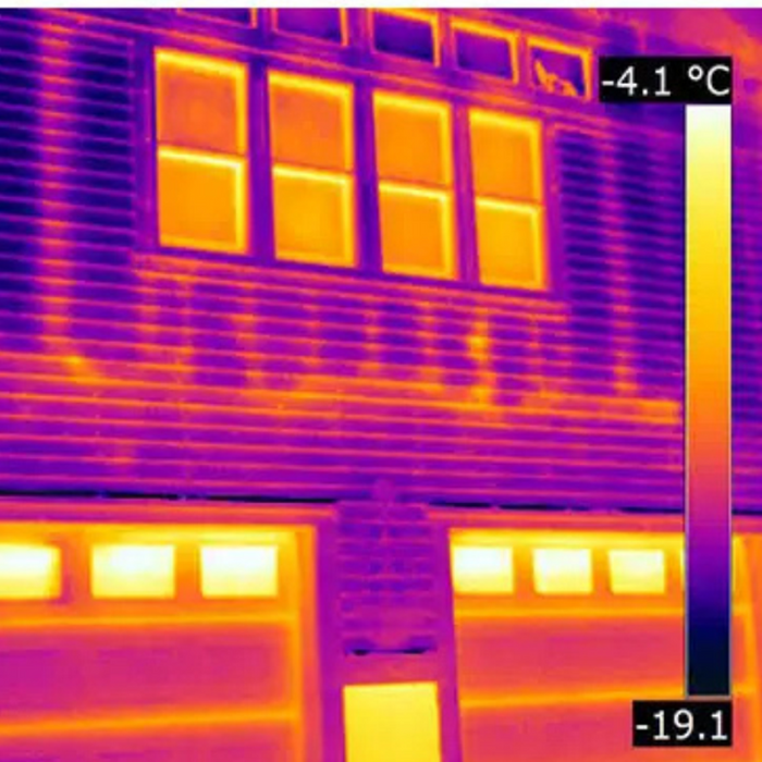Teledyne FLIR E54 24 thermal image of house facade temperature scale visible.