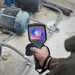 Teledyne FLIR E86 24 14 close up of thermal camera scanning machinery.