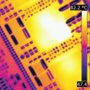 Teledyne FLIR ETS320 thermal image circuit board bright hotspot temperature scale.
