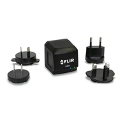 Teledyne FLIR GW65 Remote Monitoring Gateway angled view black charger with adapters.