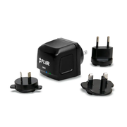 Teledyne FLIR GW65 Remote Monitoring Gateway front view black charger with multiple international adapters.