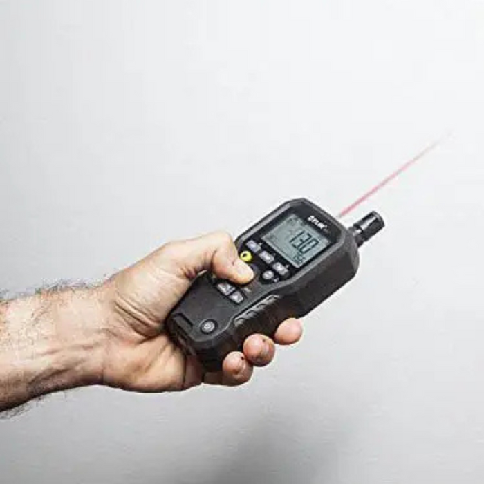 Teledyne FLIR MR77 5 In 1 Moisture Meter hand holding device laser pointing wall.