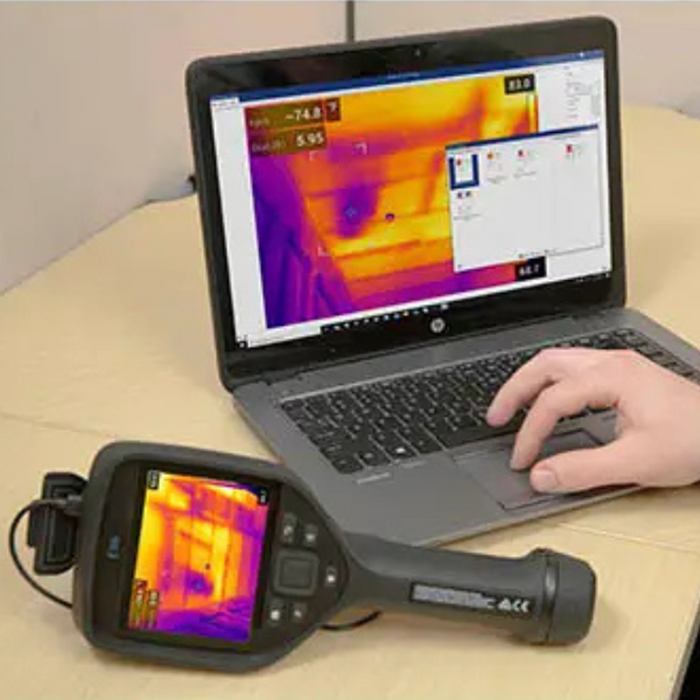Teledyne Flir E86 24 14 42 Nist thermal camera connected to laptop showing software output.