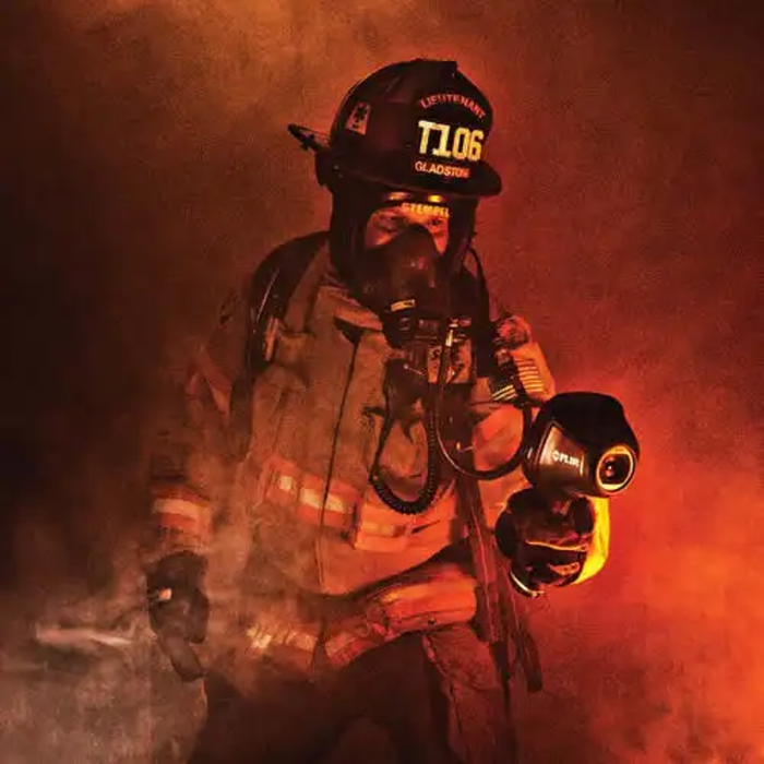 Teledyne Flir K55 firefighter using camera in heavy smoke.