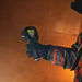 Teledyne Flir K65 firefighter using thermal camera in smoke.