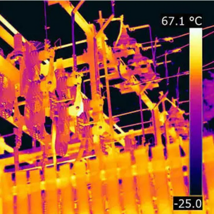 Teledyne Flir T1020 Kit 12 45 wide thermal image of substation with high temperature readings and complex components.