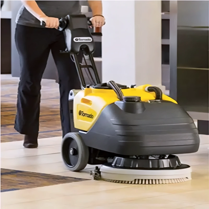 Tornado BD 17 6 Compact Cordless in use on floor.