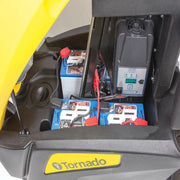 Tornado BDSO 2728 open battery compartment with wiring and charger.