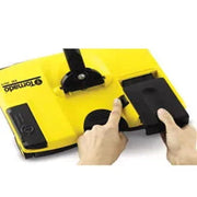Tornado EB 301 Roam Compact Battery Sweeper hands removing battery top view yellow black.