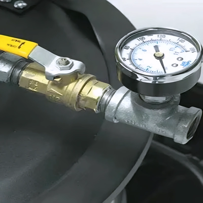 Tornado JA Dual Air Wet Only Jumbo Vacuum close up gauge metal pipe yellow handle.