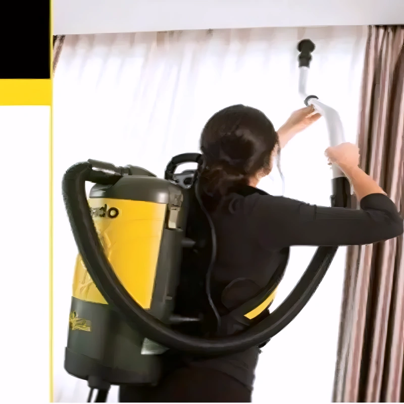 Tornado Pac Vac 10 Aircomfort in use cleaning curtain.