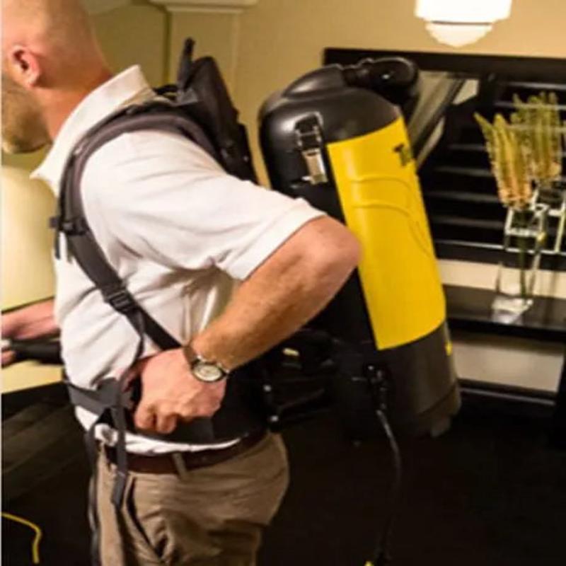 Tornado Pac Vac 6 Aircomfort side view man wearing backpack vacuum.