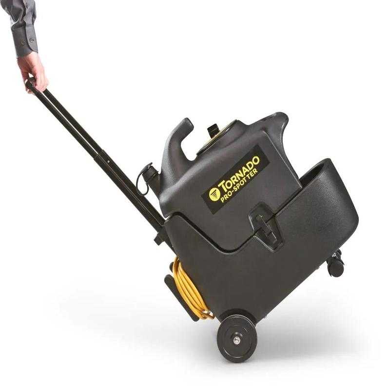 Tornado Pro Spotter tilted for transport black unit yellow label wheels handle.