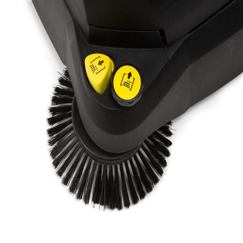 Tornado Tempest Wide Area Carpet Sweeper Vac brush closeup black bristles yellow control knobs.