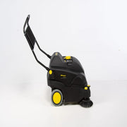 Tornado Tempest Wide Area Carpet Sweeper Vac side view black body yellow wheels handle.