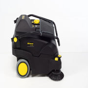 Tornado Tempest Wide Area Carpet Sweeper Vac side view handle folded black body yellow wheels.