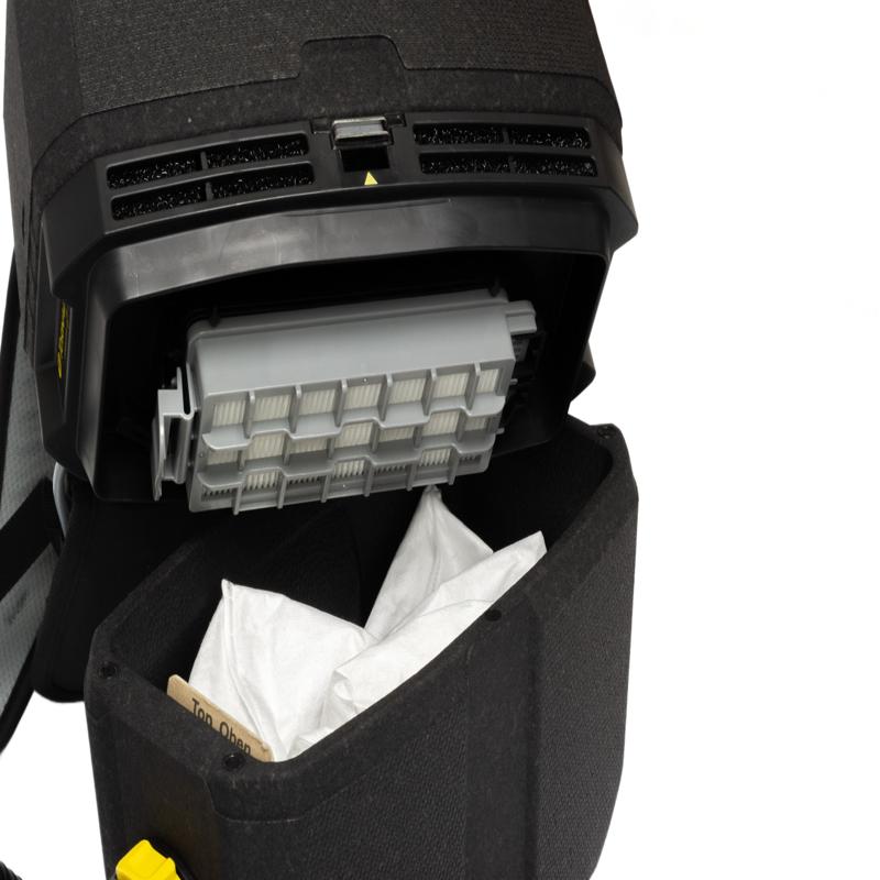 Tornado Zephyr Cordless Backpack Vacuum open filter compartment with hepa filter and collection bag.