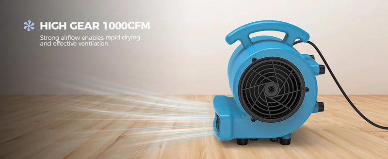 Blue AlorAir GE1000 air mover blowing across a wooden floor, with a High Gear 1000CFM label