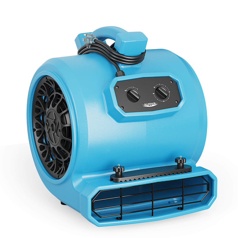 AlorAir GE4000TC air mover in blue with the carpet clamp bar across the outlet, front three-quarter view