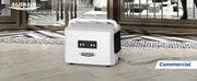 AlorAir Helios D35 on a tiled floor in a commercial space with its drain hose attached, labeled Commercial