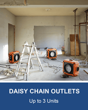 Three orange AlorAir PureAiro HEPA Max 970 scrubbers and a ladder in a gutted room, with a Daisy Chain Outlets Up to 3 Units banner
