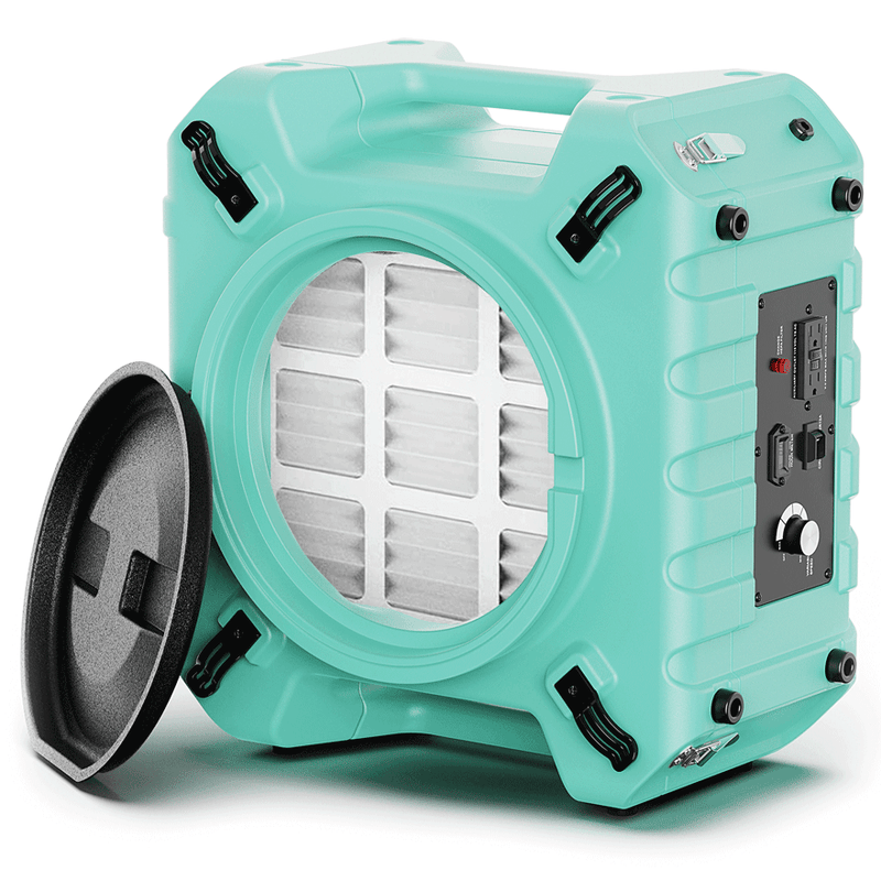 Teal AlorAir PureAiro HEPA Pro 770 air scrubber, front three-quarter view with the pre-filter visible and the inlet cap beside it