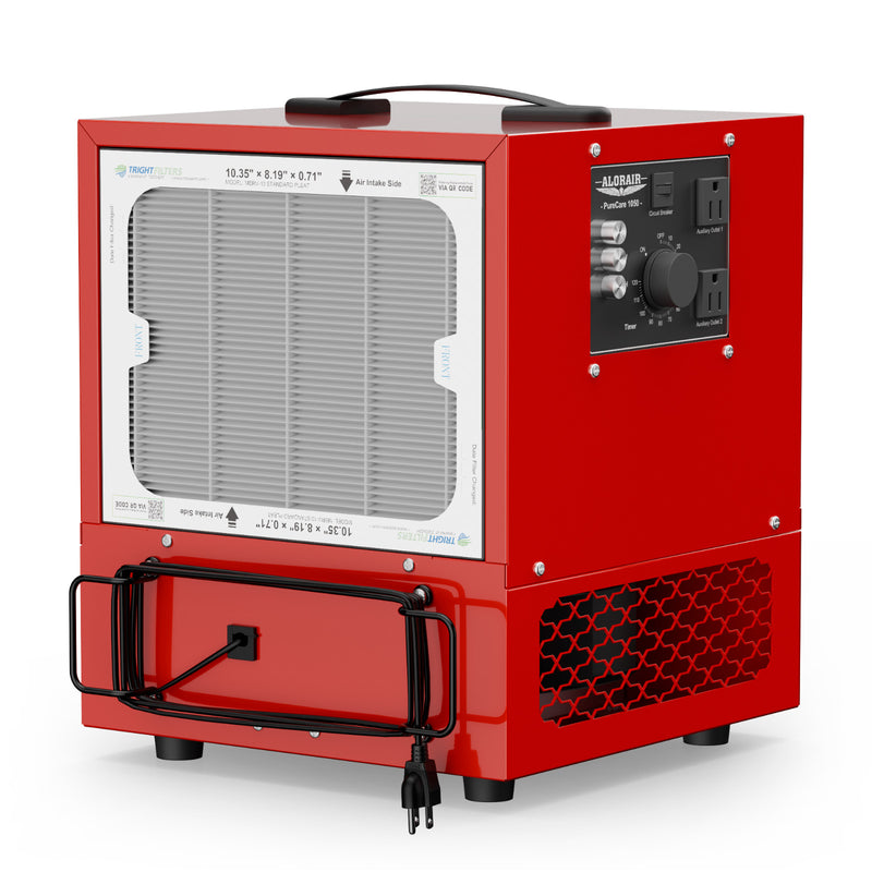 Red AlorAir PureCare 1050 portable air filtration system, three-quarter view with the side filter, control panel and top handle