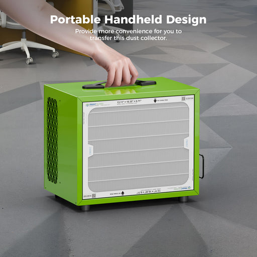 Hand lifting a green AlorAir PureCare 780S by its top handle on a shop floor, under a Portable Handheld Design caption