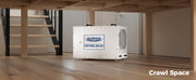 White AlorAir Sentinel HDi120 standing on its feet on a crawl space floor under open joists, captioned Crawl Space