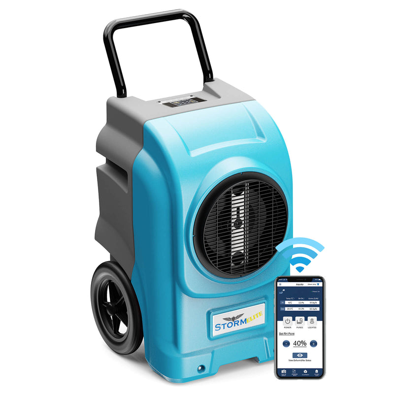 AlorAir Storm Elite in blue and gray, front three-quarter view with its round fan grille, beside a phone showing the AlorAir app