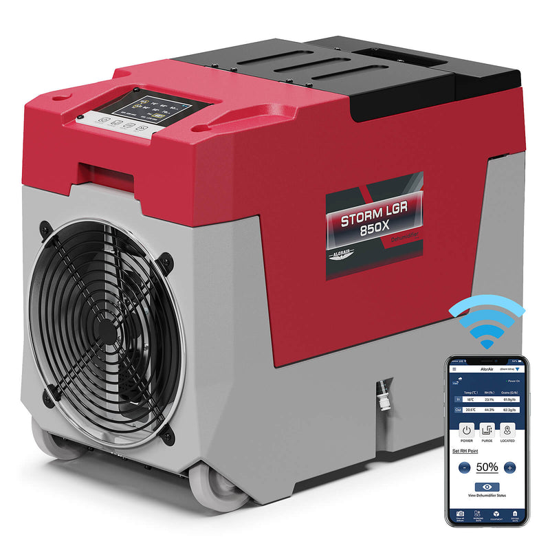 AlorAir Storm LGR 850X WiFi dehumidifier in red and gray beside a phone showing the AlorAir app
