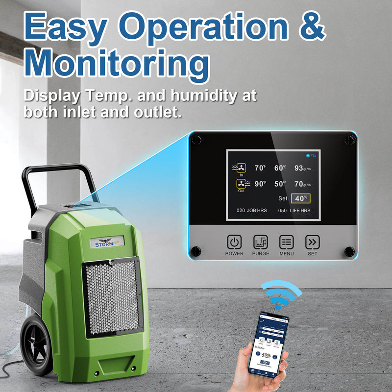 Green AlorAir Storm Pro in a concrete room with an enlarged view of its LCD and a hand holding a phone, captioned Easy Operation and Monitoring