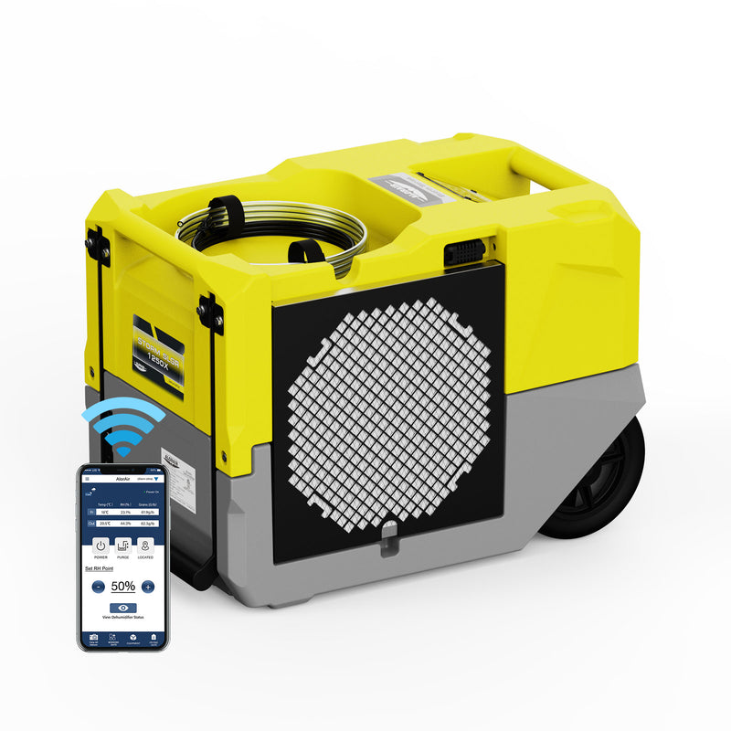 AlorAir Storm SLGR 1250X in yellow and gray, front three-quarter view beside a phone showing the AlorAir app