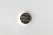 ANZZI SB-AZ022R Corner Shower Base close-up of the drain