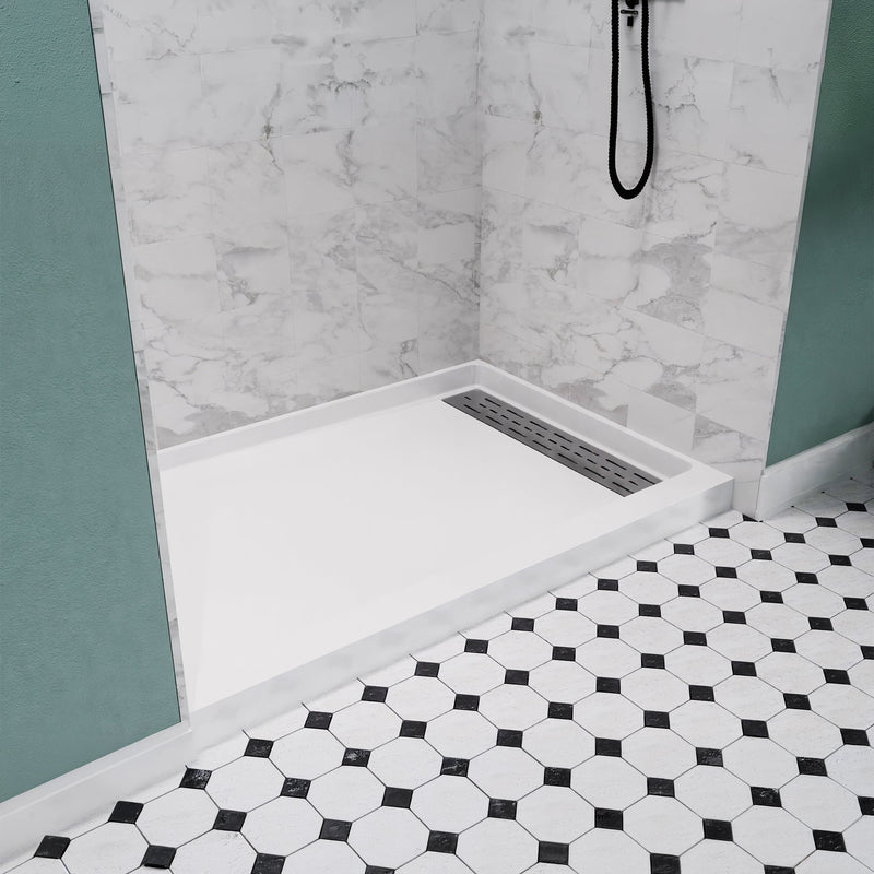 ANZZI SB-AZ103L Shower Base installed in a bathroom, angled room view