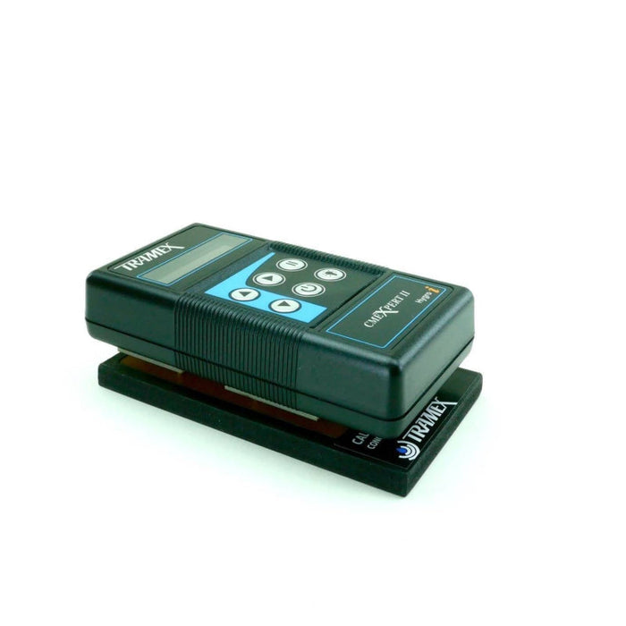 Tramex CME Calibration Check Plate - CALCRH A calibration check plate featuring a flat, gray surface with distinct measurement patterns and labels designed for verifying the accuracy of moisture meters.