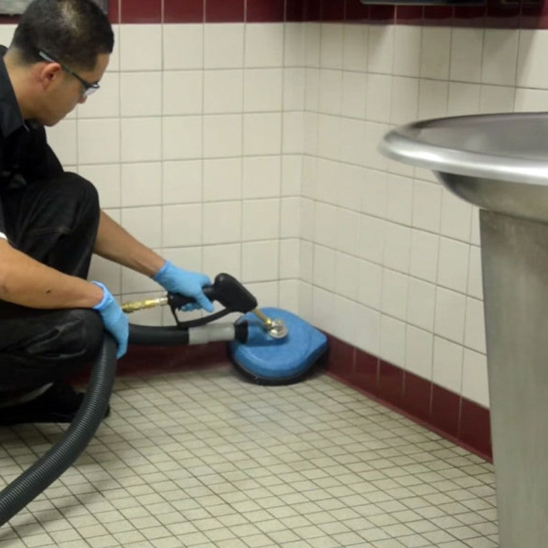 cleaning the corner with edic 700rev counter top revolution hard surface cleaning and detailing tool.