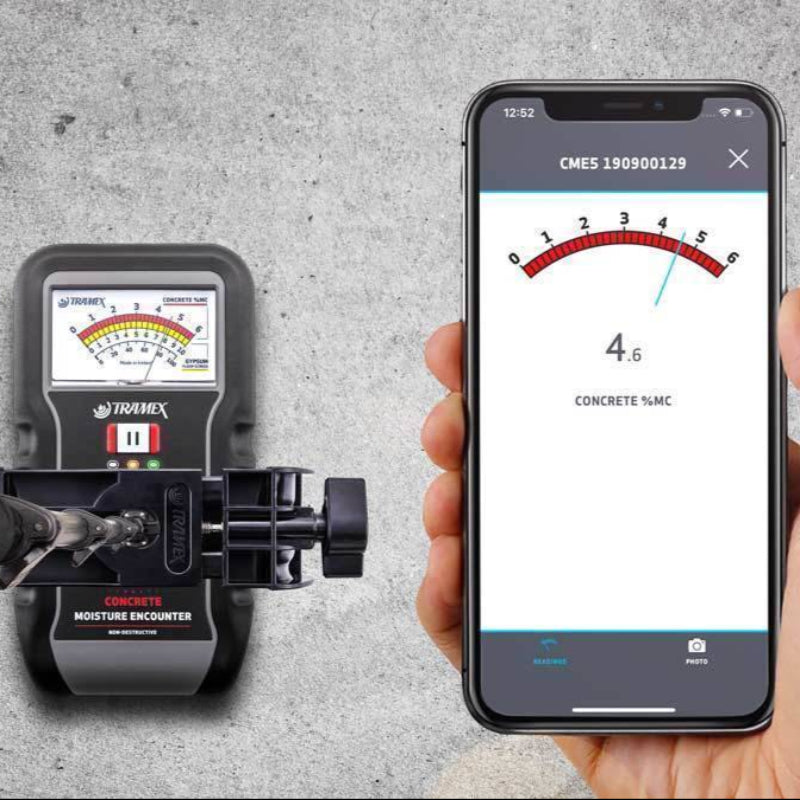 Tramex Flooring Master Kit - FMK Image of the Tramex Flooring Master Kit including an extension handle, an iPhone attachment, and moisture measurement tools arranged on a flat surface, showcasing its professional-grade design for checking moisture in various flooring materials.