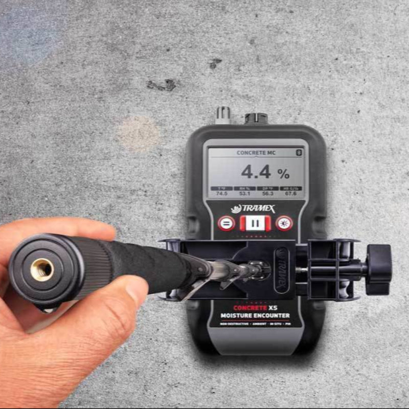 Tramex CMEX5 - Concrete Moisture Encounter CMEX5 image showing the device with an extension handle attached, designed for measuring moisture levels in concrete surfaces, featuring a digital display and ergonomic design for ease of use in various environments.