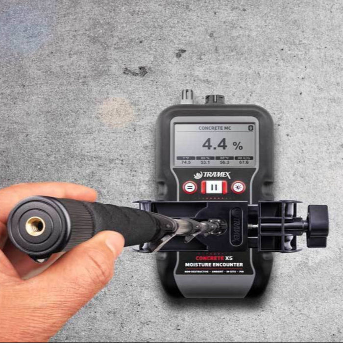 Tramex CMEX5 - Concrete Moisture Encounter CMEX5 image showing the device with an extension handle attached, designed for measuring moisture levels in concrete surfaces, featuring a digital display and ergonomic design for ease of use in various environments.