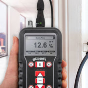 Tramex CMEX5 - Concrete Moisture Encounter CMEX5 image showing a handheld moisture meter designed for measuring moisture levels in concrete. The device features a digital display, control buttons, and a pin probe for accurate readings.