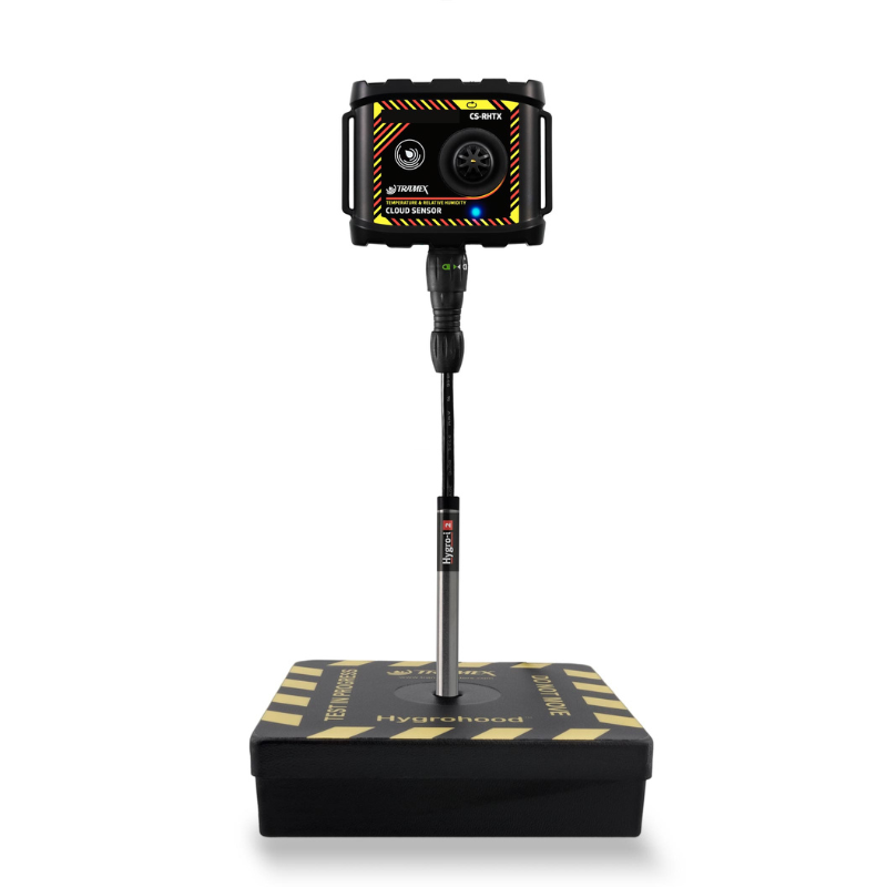 Tramex Hygrohood for TREMS Xtra - RHIH Image showing the Tramex Hygrohood attached to a moisture meter, designed for measuring relative humidity and temperature in various materials. The Hygrohood features a sleek design and is shown in a vertical position, indicating its usability for accurate reading.
