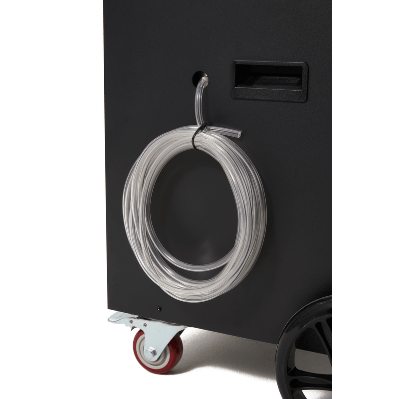 Dapper Supply 290-pint commercial dehumidifier drain hose and cord storage closeup.