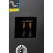 Dapper Supply 350-pint commercial dehumidifier drain valves and pump outlet closeup.
