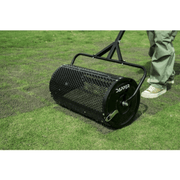 Dapper Supply 24-inch compost spreader close-up of the mesh drum and end wheel on grass.
