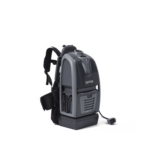 Dapper Supply cordless backpack vacuum front angle with harness.