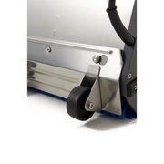 Dapper Supply 14-inch counter-rotating brush floor machine close-up of edge guide wheel.