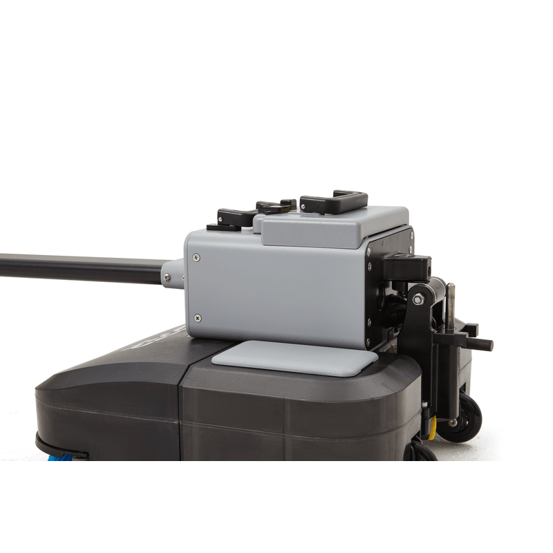 Dapper Supply 16-inch battery walk-behind floor scrubber cleaning a concrete floor.