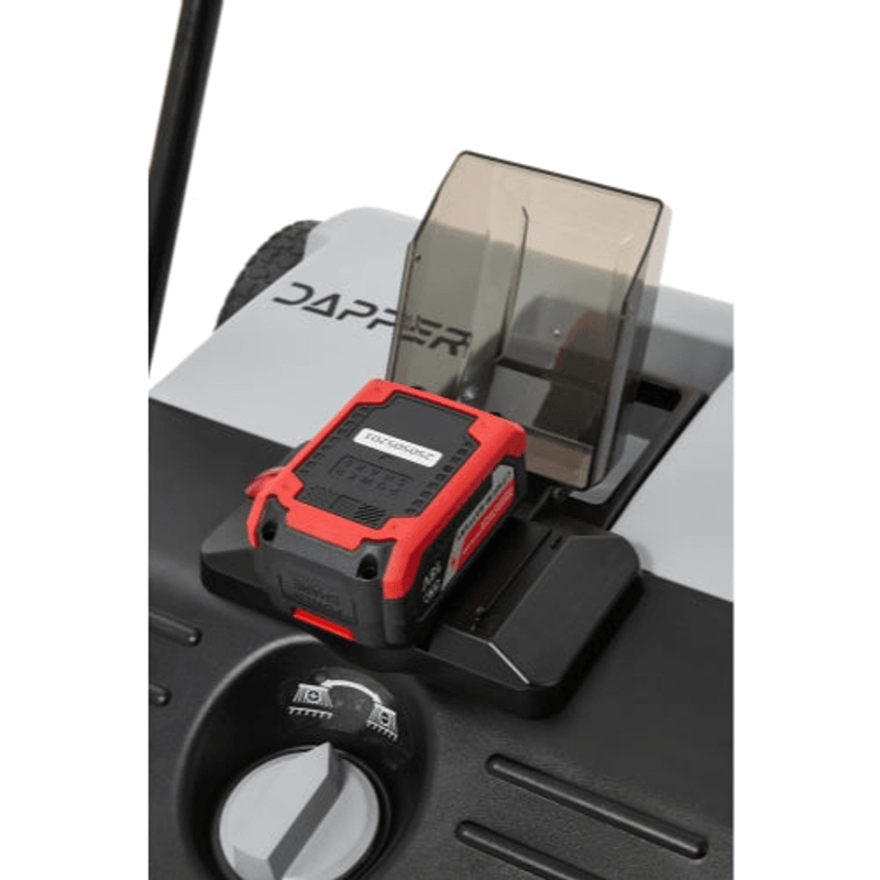 Dapper Supply 22-inch battery-powered sweeper battery dock and debris bin closeup.