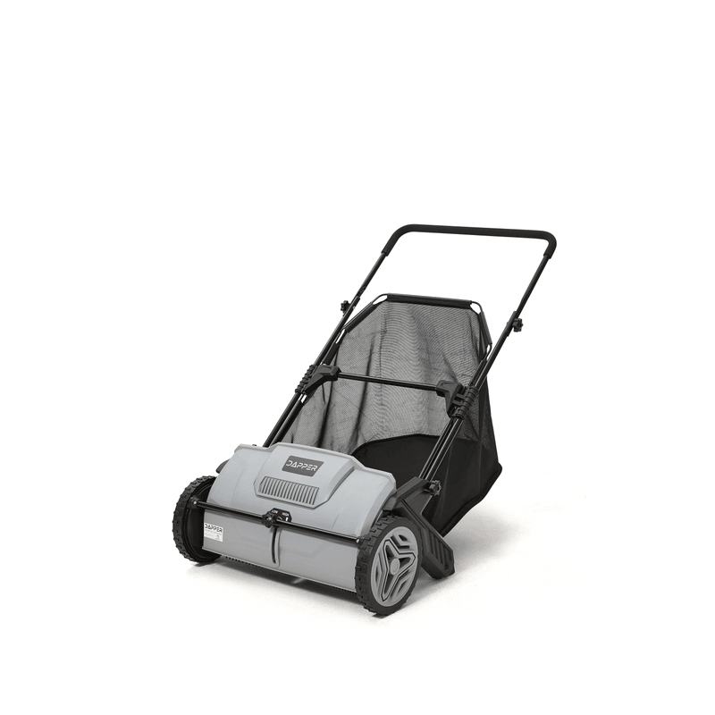 Dapper Supply 21-inch push lawn sweeper side angle view.